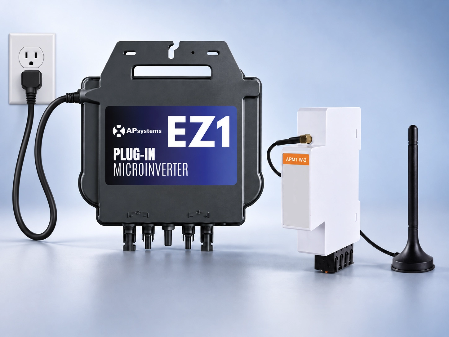 APsystems EZ1 plug-in microinverter connected to a wall outlet with a white control module and antenna nearby.