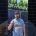 Man in a blue shirt stands in front of solar panels, with overlay text 'DIY Friendly' and 'AND I DO MEAN YOU CAN HOOK UP'—emphasizing DIY solar hookup.